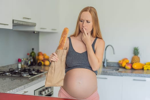 Pregnant woman eating bread in the kitchen. Exploring the impact of gluten during pregnancy: understanding the potential benefits and risks for maternal health and fetal development.