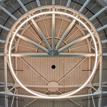 Modern architectural ceiling design with circular lighting in Charlotte, North Carolina airport