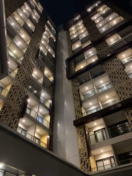 Tall building perspective during night time, business background, business template background, presentation background for your creative content creation