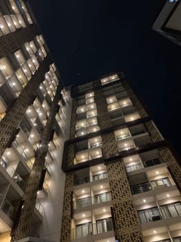 Tall building perspective during night time, business background, business template background, presentation background for your creative content creation