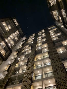 Tall building perspective during night time, business background, business template background, presentation background for your creative content creation