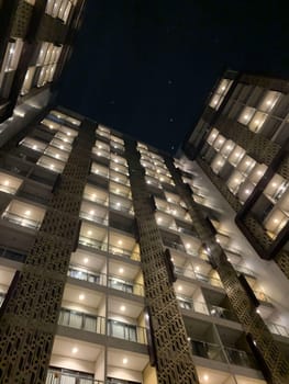 Tall building perspective during night time, business background, business template background, presentation background for your creative content creation