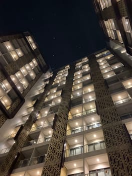 Tall building perspective during night time, business background, business template background, presentation background for your creative content creation