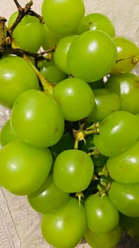 seedless green Shine Muscat grape background in a container. Japanese grapes. white grapes local produce