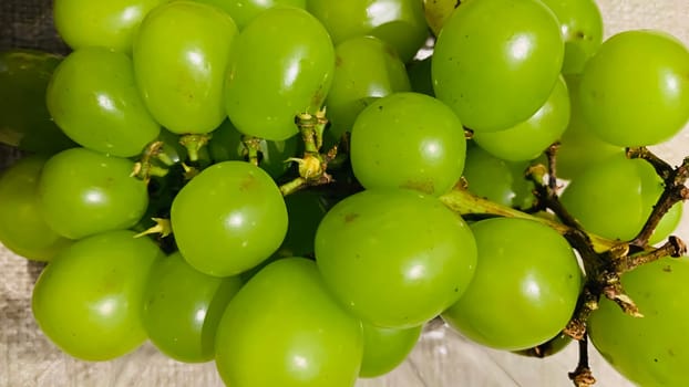 seedless green Shine Muscat grape background in a container. Japanese grapes. white grapes local produce