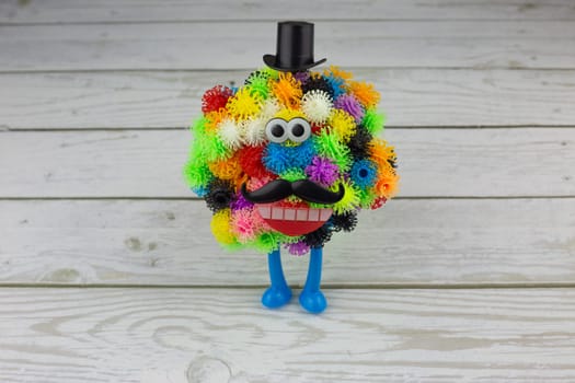 Ball monster made from velcro construction set, colored balls with hooks for creating characters, modern toy