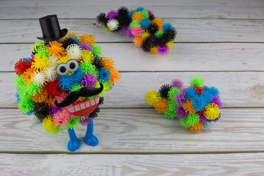 Funny sticky construction toy, character made of fluffy plastic balls with hooks, child development toy