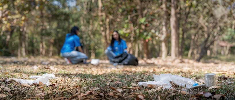 Garbage collect volunteer collect up plastic bottles put garbage at parks avoid pollution be friendly to the environmental and ecosystem.