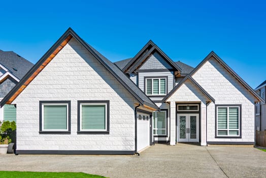 A perfect neighbourhood. Brand new luxury family house on bright winter day in Surrey, BC, Canada.