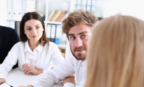 Group of people deliberate on white board problem in office closeup. Graph consult idea participate creative talk review situation job document explain council train successful decision concept