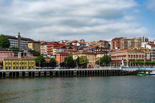 Portugalete, Basque Country, Spain - 20.07.2022: View of Portugalete town by Nervion river