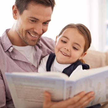 Father, child and reading book for fairytale, happy with bonding at home and knowledge for education. Man, young girl and story time for fantasy and learning with love and care together in lounge.