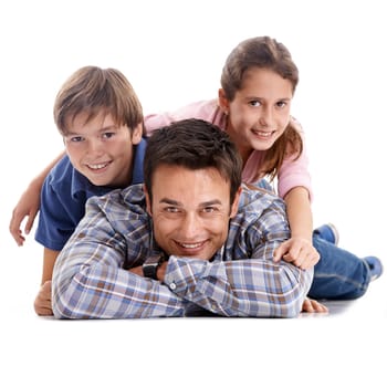Family, father and portrait of children on a white background for bonding, relationship and love. Family, parenthood and dad, son and daughter on floor for support, care and affection in studio.
