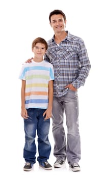 Happy father, portrait and hug with child in fashion for family bonding on a white studio background. Dad, son or kid with smile in casual clothing, support or or trust for parenthood or childhood.