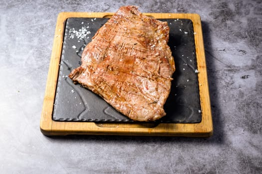 Beef ribs on wood board,