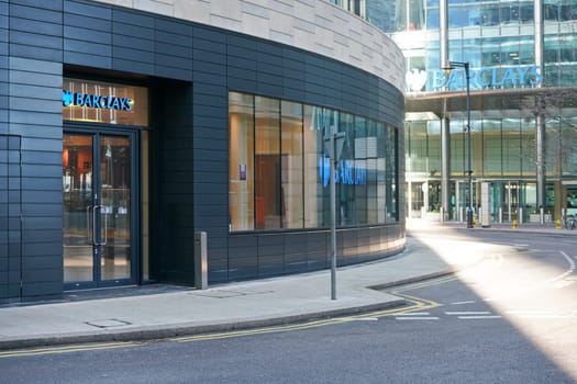 London, United Kingdom - February 03, 2019: Blue Barclays logo at their branch in Canary Wharf. It is British multinational investment bank, one of largest world banks.