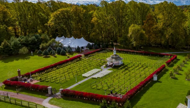 Elizabethtown, Pennsylvania, October 22, 2023 - An Aerial View of a Large Gazebo in the Middle of a Vineyard, With Seating for a Weddings on an Autumn