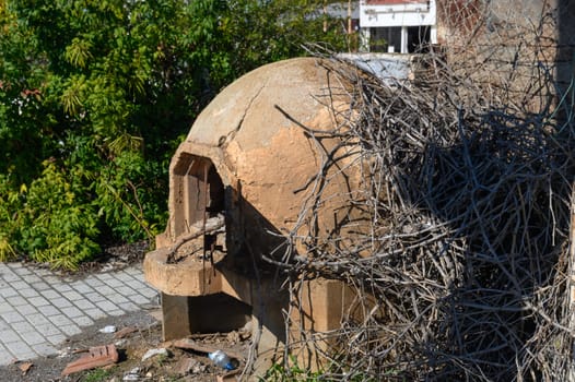 Cypriot outdoor wood stove on the street