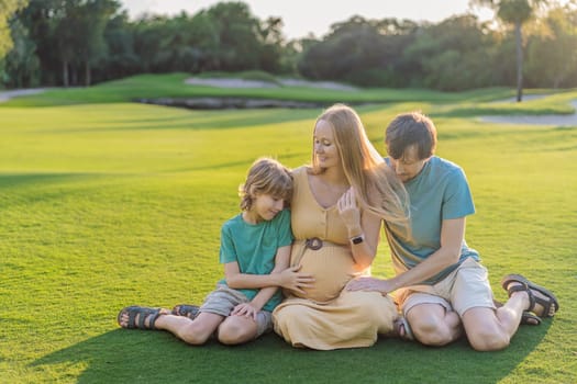 Joyful family time as a pregnant woman, her husband, and son share quality moments outdoors, embracing the beauty of nature and creating cherished memories together.