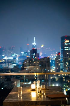 Bangkok skyline view at night from a rooftop restaurant, Bangkok Thailand. High quality photo