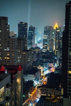 Bangkok skyline view at night from a rooftop restaurant, Bangkok Thailand. High quality photo