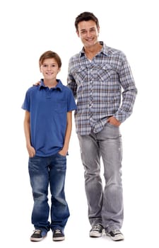 Happy father, portrait and kid with fashion in style for family or bonding on a white studio background. Dad, son or child with smile in casual clothing, support or trust for parenthood or childhood.