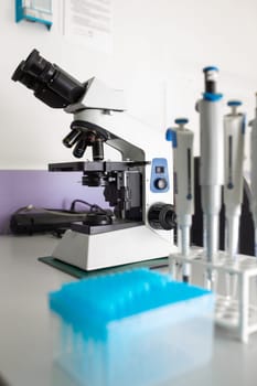 Microscope on the table in the laboratory, the technology of scientific research.