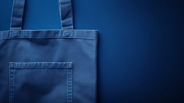 A blue bag with a pocket on the side of it