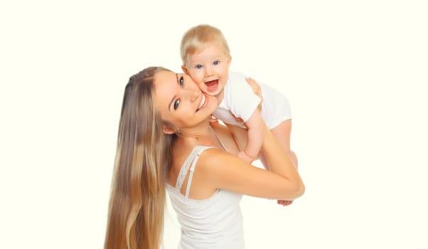 Portrait of happy cheerful smiling young mother playing with cute baby isolated on white studio background