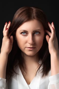 Portrait thoughtful adult woman worrying about personal problems. Headshot portrait of female with headache raised hands near her head and looking away. Mental health, stress and depression concept