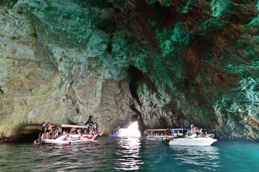 Kotor, Montenegro - June 10. 2019. Boats with tourists in Blue Cave , tourist attraction