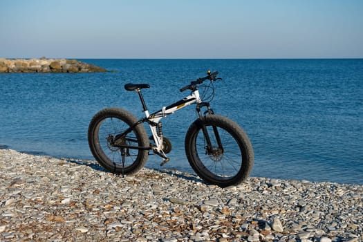 Parked on the beach bike waiting for the continuation.