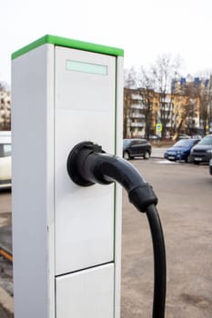 Electric Vehicle Charging Station at parking close up