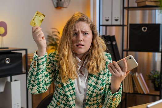 Angry mad stressed female freelancer try to pay online shopping with laptop blocked credit card. Annoyed businesswoman girl buying, bank refuse problem unsuccessful payment lack of money balance.