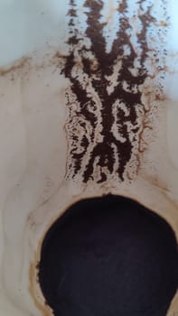 coffee grounds stain in white cup. High quality photo
