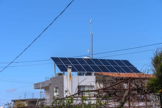 solar panels on the roof of a house in the village 2