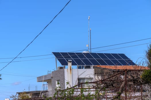 solar panels on the roof of a house in the village 1