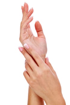 Closeup shot of woman's hands with french manicure and clean and soft skin, isolated

