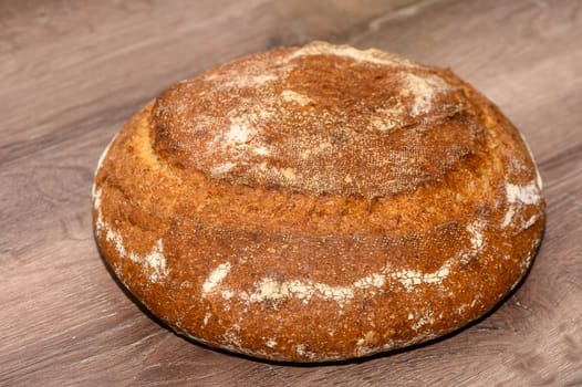 appetizing homemade whole grain bread on a wooden table 6