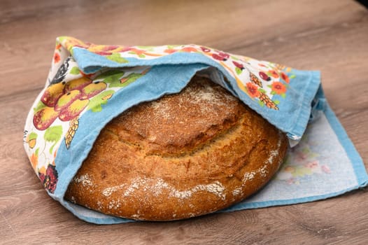 appetizing homemade whole grain bread on a wooden table 1