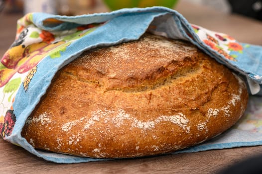 appetizing homemade whole grain bread on a wooden table