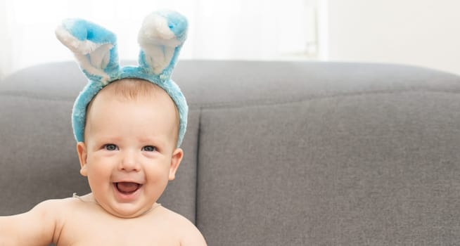 Boy dressed as bunny and Easter eggs.