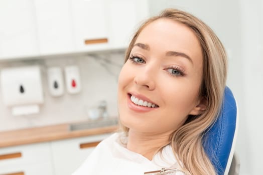 Woman patient in dentist office. Perfect smile concept