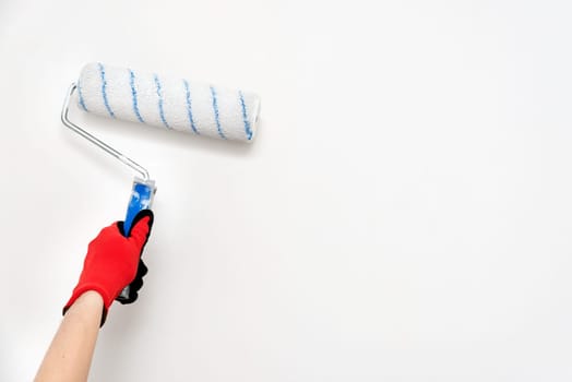 Close up of painter, roller painting. Painting, renovation walls