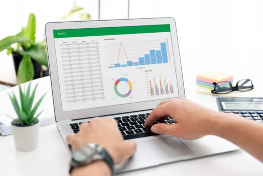 Analyzing data for marketing plan. Business analytics, spreadsheet app on laptop