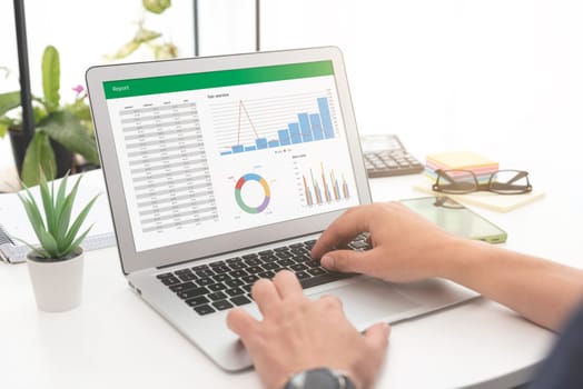 Analyzing data for marketing plan. Business analytics, spreadsheet app on laptop