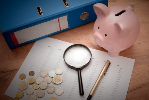 Business and finance concept with piggy bank and calculator