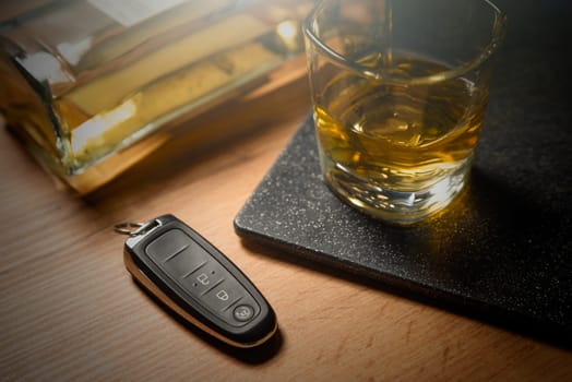 Drink and drive, alcoholism with car keys concept