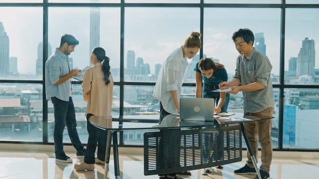 Group of diverse business people brainstorming about marketing plan. Professional multicultural business team working, talking, presenting about financial strategy at modern office. Tracery