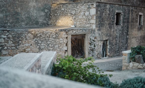 Abandoned stone house on street of Old Town, Biograd na Moru port in Croatia